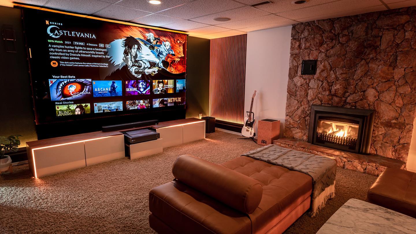 Futuristic home theater setup with smart TV and ambient lighting